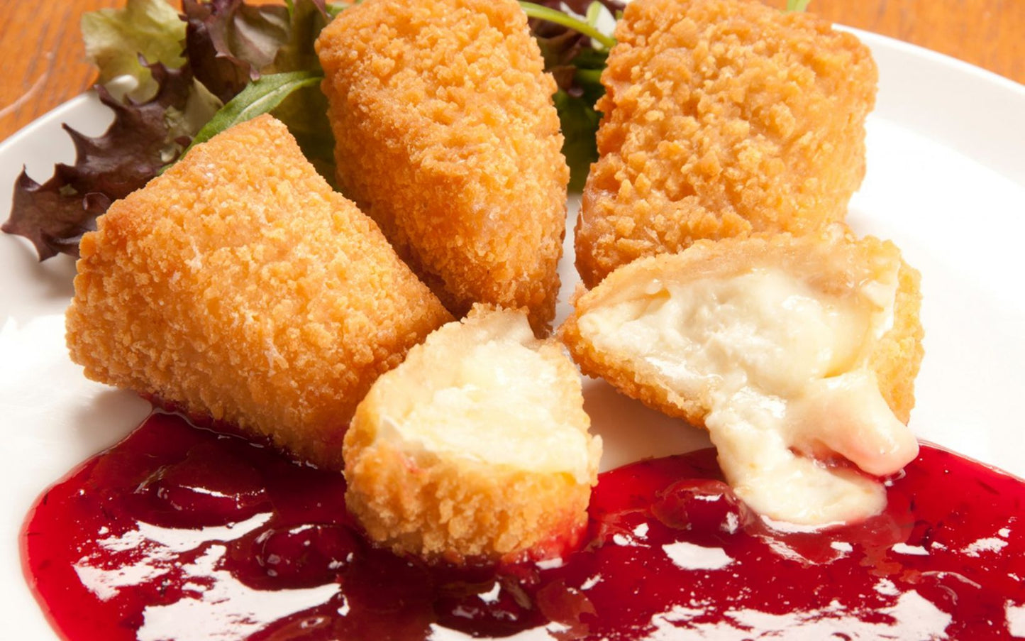 Frozen Coated Brie Wedges 1kg / 24